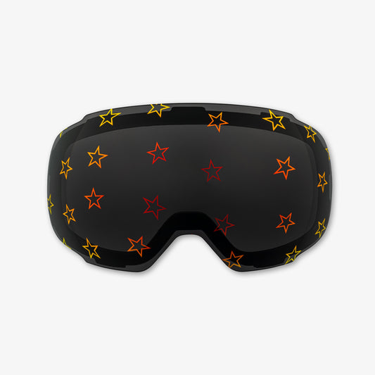 Close-up of the Starstruck Lens, a magnetic ski and snowboard goggle lens featuring bold star designs. Highlights the easy-swap magnetic feature, vibrant patterns, and high-performance clarity for style and adaptability on the slopes. Perfect for pairing with Skoggl frames.
