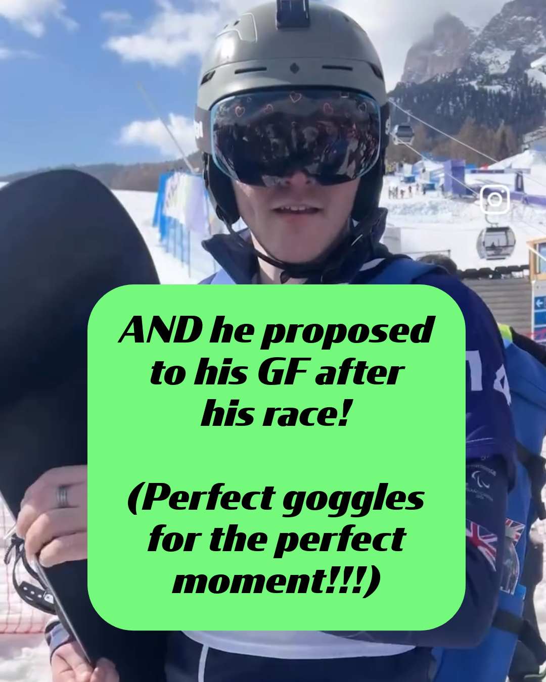 A shot of Matt Hamilton at the base of the snowy Paralympic race course, holding his snowboard and wearing custom ski and snowboard goggles from Skoggl. The goggles have hearts on the lens and a blue frame. A green text box reveals that he proposed to his girlfriend after his race, calling them the "Perfect goggles for the perfect moment!!!"