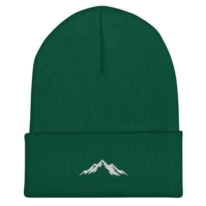 Green beanie with skoggl mountain design on a white background