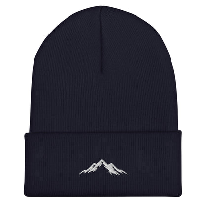 Navy beanie with skoggl mountain embroidery on a white background