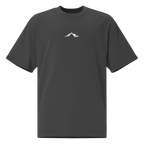 Faded black Skoggl t-shirt with white mountain design and logo centered on chest
