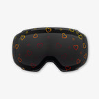 Close-up of the Sweetheart Lens, a magnetic ski and snowboard goggle lens featuring playful heart designs. Showcases the easy-swap magnetic feature, vibrant colors, and high-quality clarity for style and performance on the slopes. Perfect for pairing with Skoggl frames.