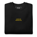 Black Skoggl Après Ski Instructor sweatshirt with yellow embroidered chest text, fleece-lined for warmth.