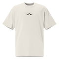 Front view of Skoggl Original heavyweight oversized t-shirt in Washed Oat, featuring a black mountain logo on the chest and a drop-shoulder fit.