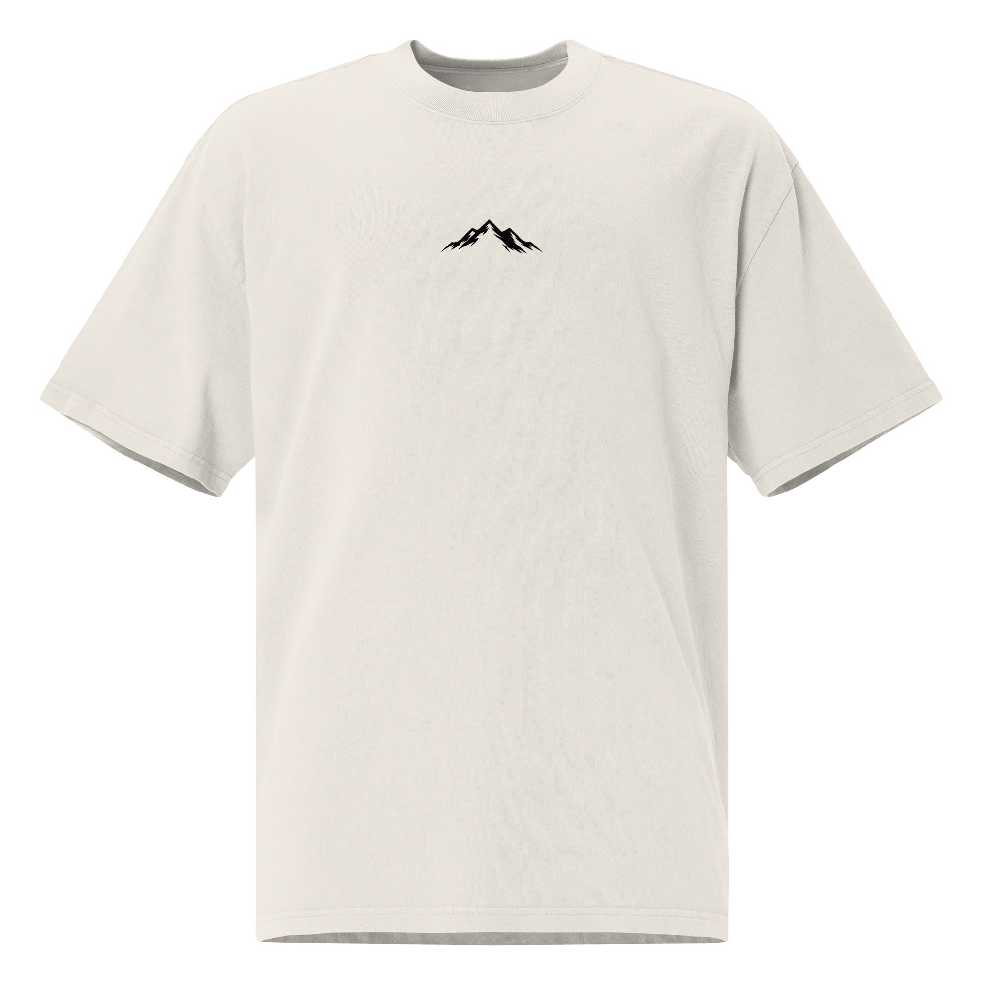 Front view of Skoggl Original heavyweight oversized t-shirt in Washed Oat, featuring a black mountain logo on the chest and a drop-shoulder fit.