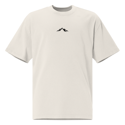 White t-shirt with a black mountain logo on a white background