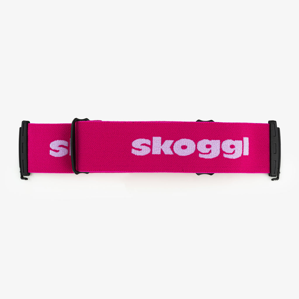 A vibrant pink strap designed for ski and snowboard goggles, featuring durable material and easy attachment for a secure, customizable fit. Perfect for pairing with Skoggl frames to add a pop of color and style to your winter sports gear.