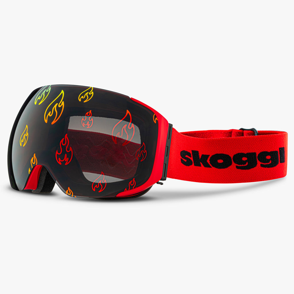 Skoggl Flare Vision ski goggles with magnetic flame-printed lens and red strap – custom snow goggles with anti-fog, UV400 protection, and bold interchangeable design.
