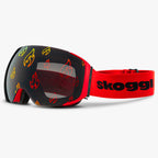 Skoggl Flare Vision ski goggles with magnetic flame-printed lens and red strap – custom snow goggles with anti-fog, UV400 protection, and bold interchangeable design.