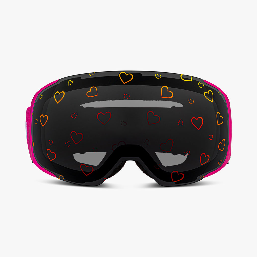 Front view of Skoggl Lovefrost ski and snowboard goggles with hearts on the lens, featuring a pink frame, pink strap, and sunny skies lens. The playful heart design combines style and performance, making these goggles perfect for skiing, snowboarding, and winter sports.