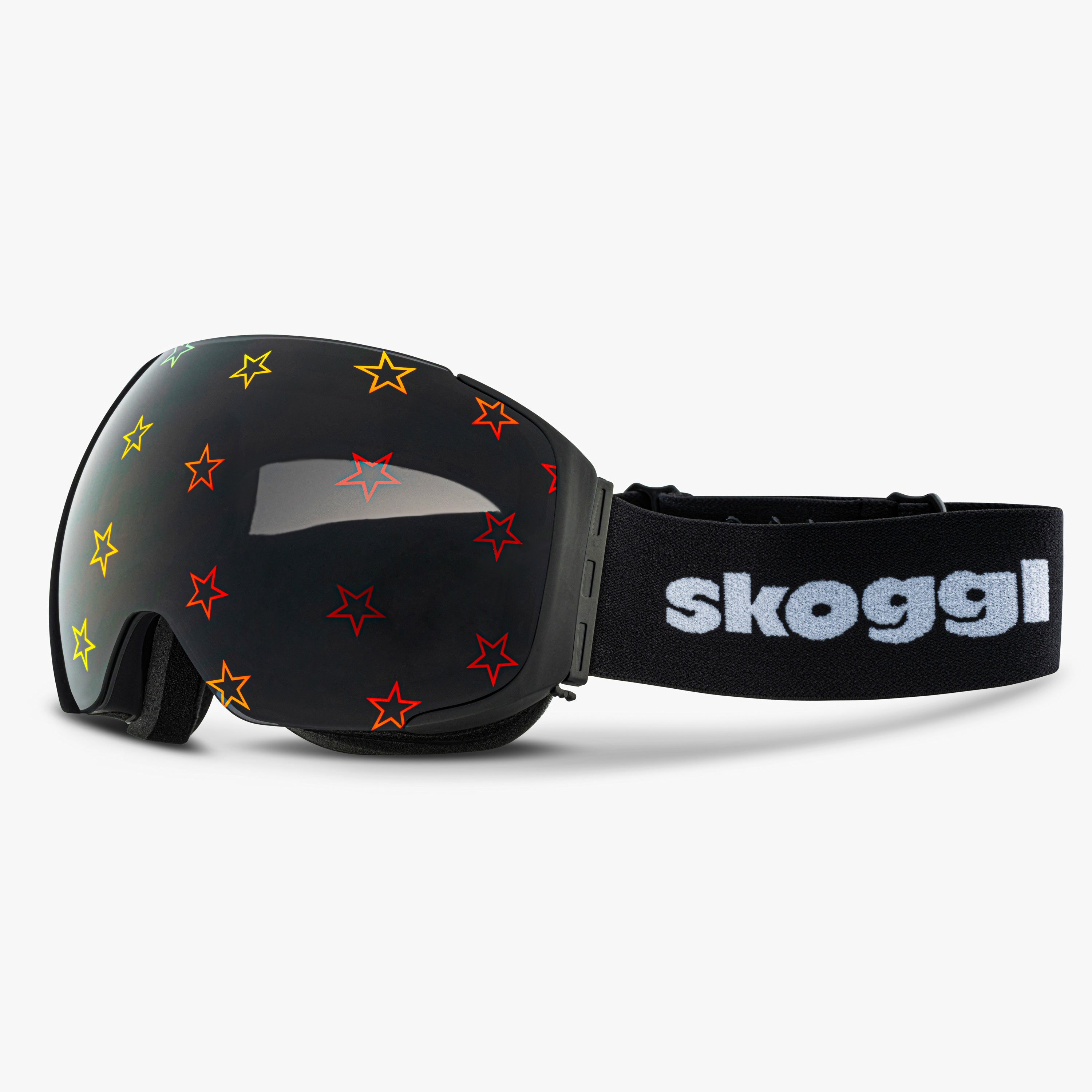 Black ski and snowboard goggles with star designs on the lenses, showcasing the bold Starstruck Lens. Features the word 'Skoggl' on the strap, highlighting customizable, magnetic goggles for style and performance on the slopes.