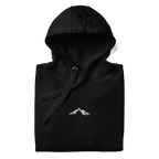Black hoodie with a white skoggl mountain logo on a white background